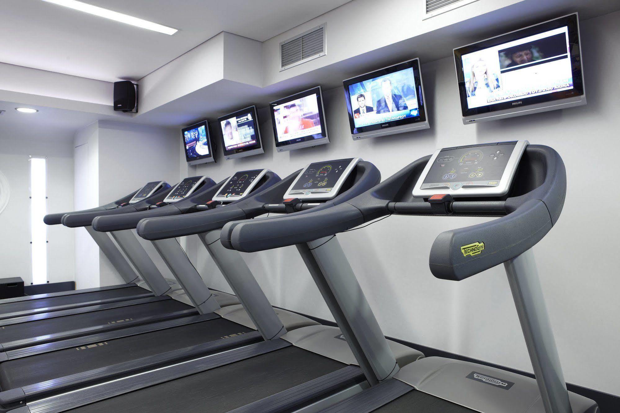 Limneon Resort & Spa Castória Exterior foto A row of treadmills